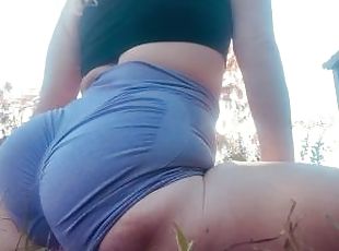 Stretchy flexible pawg country girl stretches and strips outside on the land