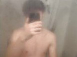 Cute teen jerks off before shower