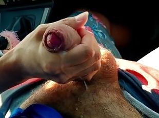 Sweet petite gives nice handjob in rented car