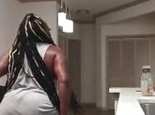 His wife in the kitchen twerking