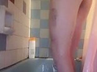 Shaking small ass in the shower playing with pussy