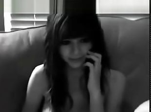 Stickam girl plays while talking on phone