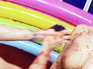 Lesbians With Big Boobs Play In An Inflatable Pool