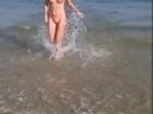 Slow Motion Naked Running Video at Public Beach