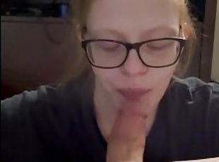 Red head with glasses gives great blowjob