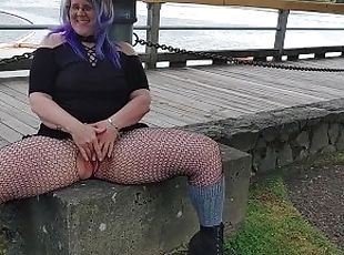 Blue haired Woman risky mastrubates in  public business park