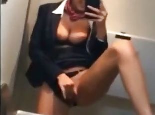 Naughty stewardess with hot tits masturbates in toilet