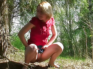 Sexy blouse on girl pissing in the woods
