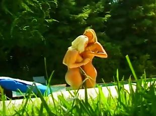 Hot lesbian blondes have sex in pool