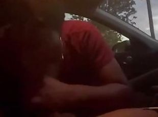 Ebony giving head in the car